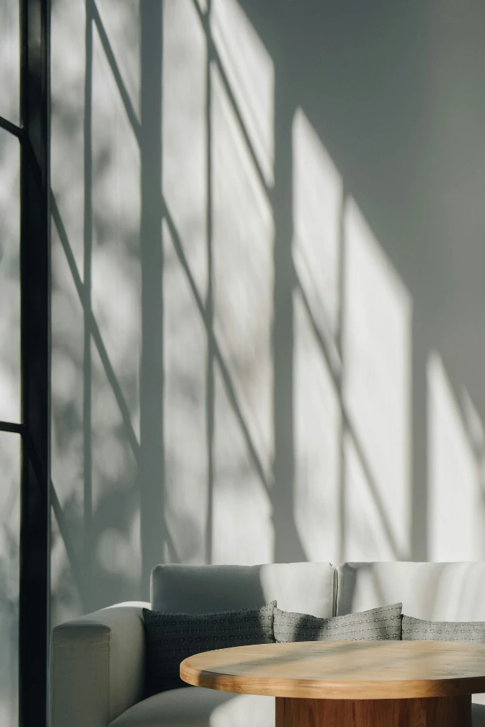 sunlit interior with sofa and table